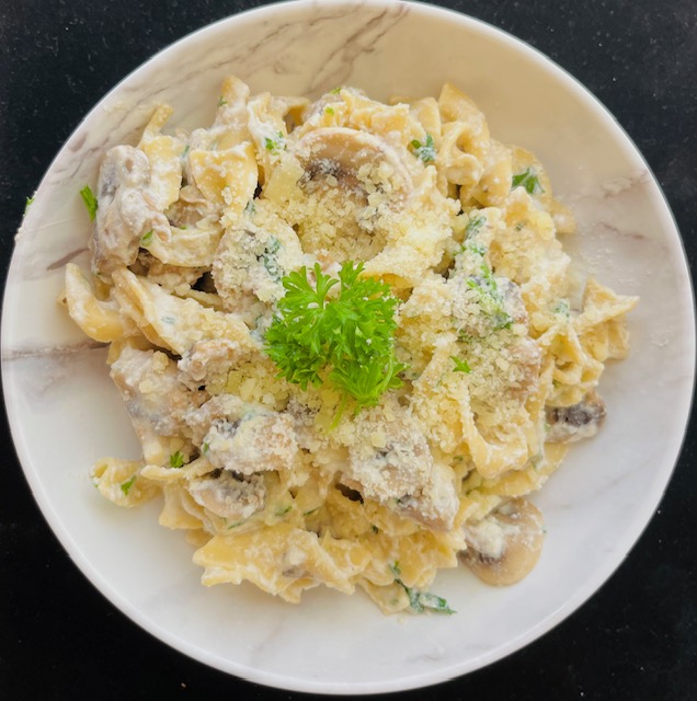 Creamy mushroom pasta made with ricotta cheese and parsley
